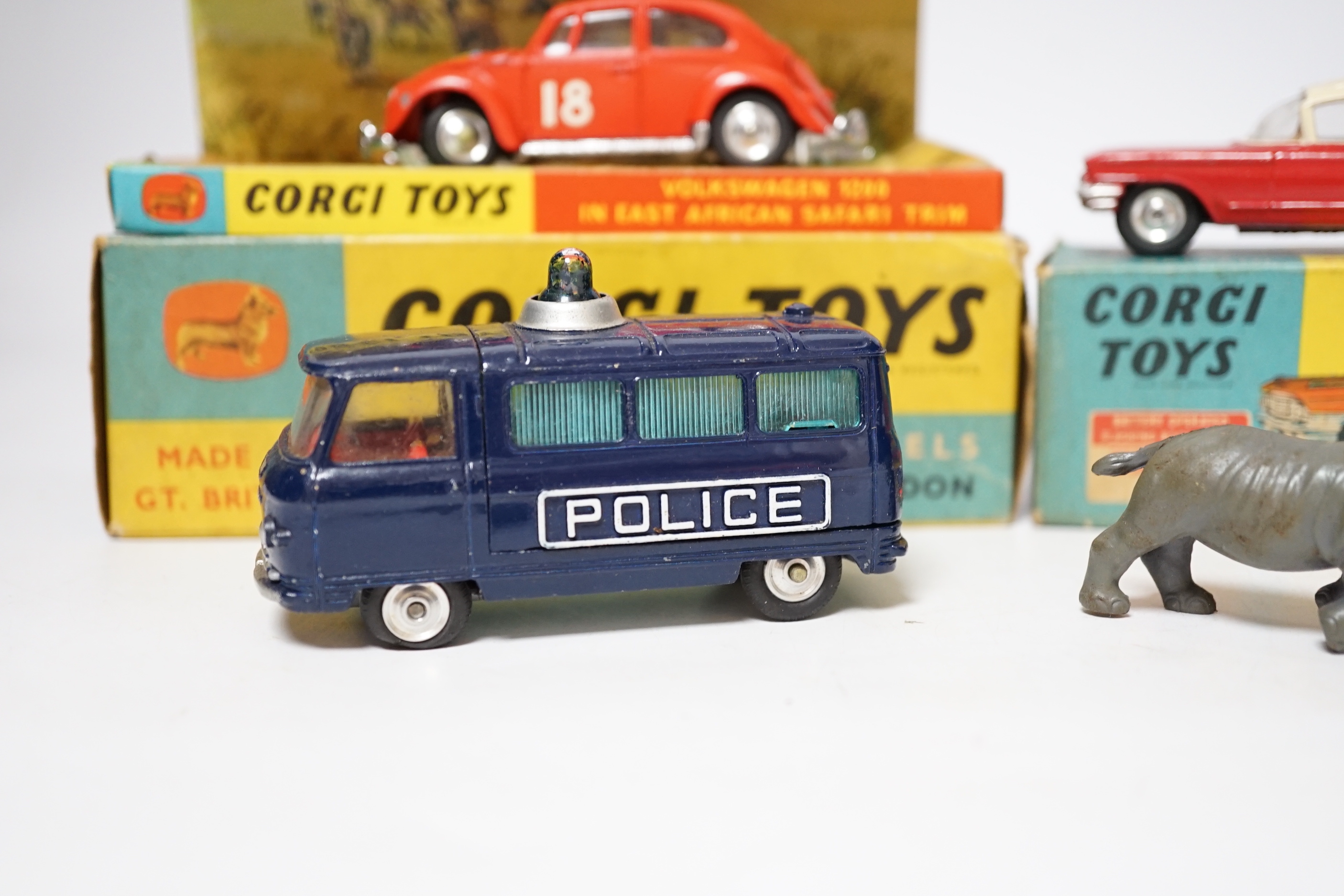 Three Corgi Toys including (256) Volkswagen 1200 in East African safari trim (with rhino and inner display stand), (437) Cadillac Superior Ambulance, both boxed, together with an unboxed Commer three-quarter ton police v